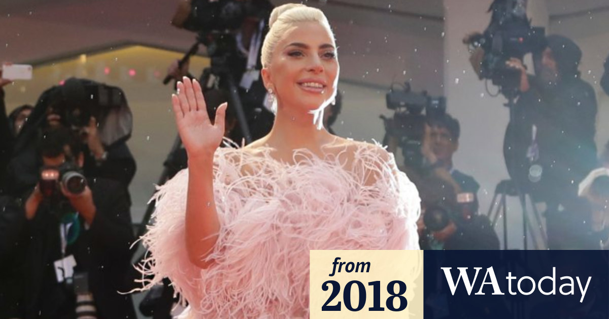 Lady Gaga is a high fashion flamingo on the Venice red carpet