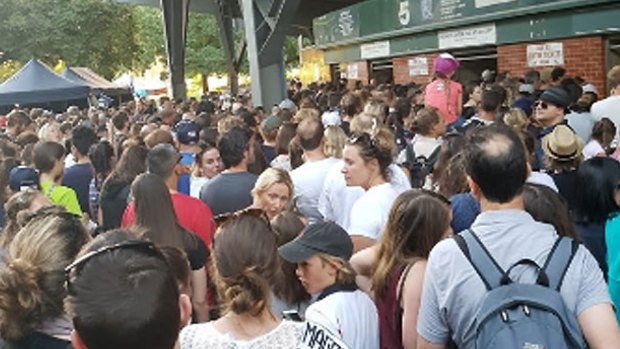 Crowds gather outside Ikon Park.