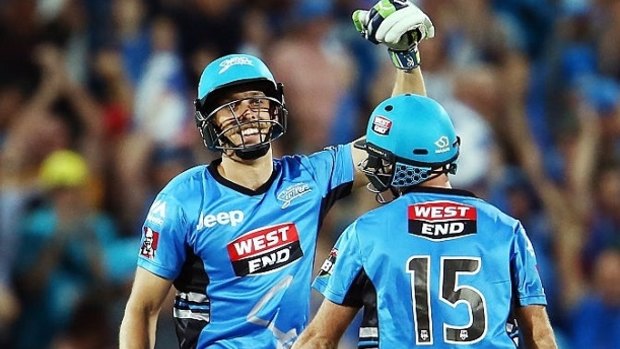 Jake Lehmann (left) celebrates his last-ball heroics that guided the Adelaide Strikers to a memorable six-wicket victory over the Hobart Hurricanes.