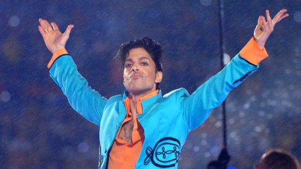 Prince appreciates the crowd during his 2007 Super Bowl half-time performance.