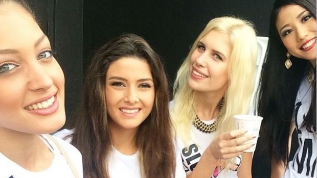 The selfie: Miss Israel Doron Matalon, left, with Miss Lebanon Saly Greige, Miss Slovenia, and Miss Japan.