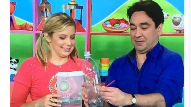 Host Alex Papps doing a craft project on Play School that many viewers on social media say looks like a homemade bong.
