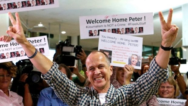 Peter Greste arrives home at Brisbane Airport