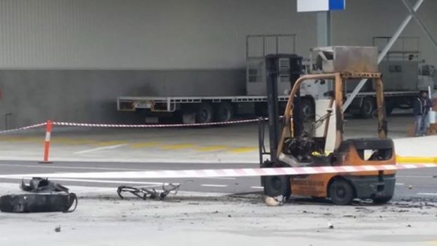 The burnt-out forklift.