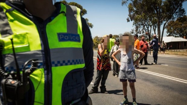 Parents are under fire for their decision to take children to a violent rally in Melton.