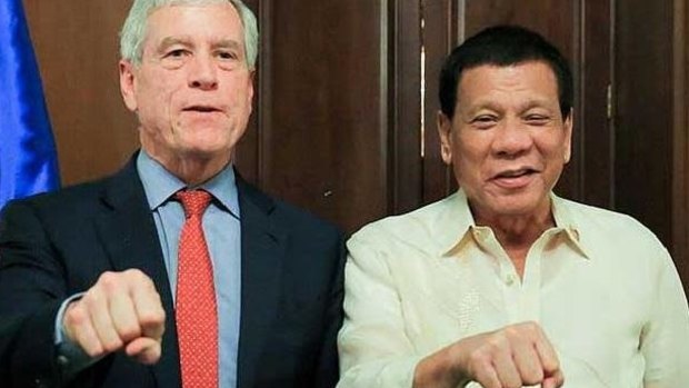 Australia's spy chief Nick Warner with Philippine president Rodrigo Duterte in Manila. 