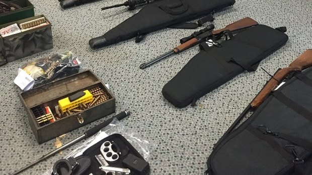 A number of weapons, including 15 firearms, were uncovered during raids across far north Queensland