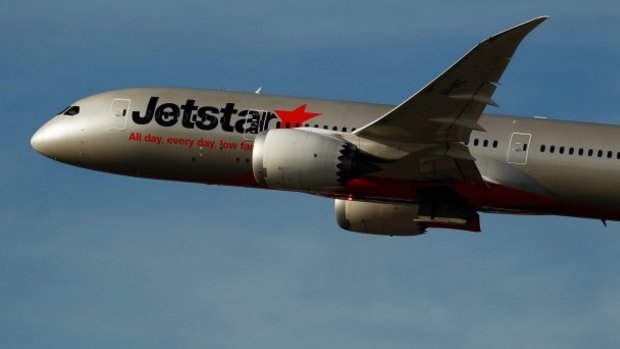 Police questioned a woman who was smoking on a Jetstar flight.