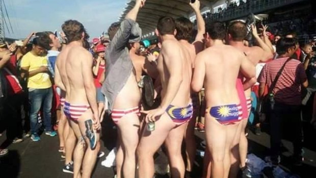 The nine Australians  in the offending budgie smugglers. 