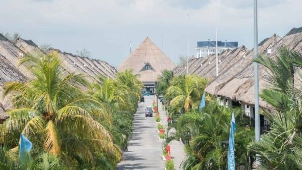 The main 'trunk' of the resort is coconut-lined.