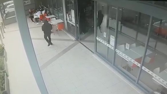 CCTV shows the gunman approaching Walid "Wally" Ahmad at Bankstown.
