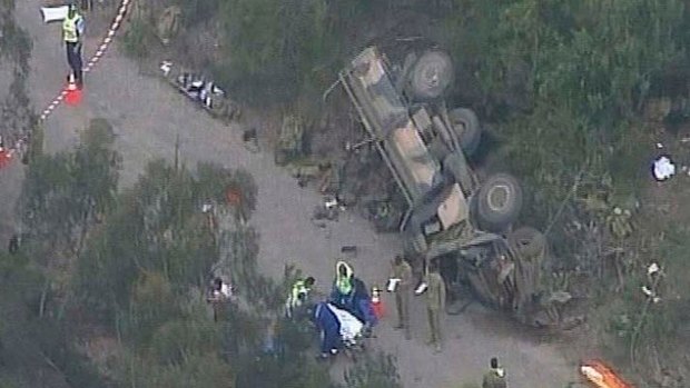 The open-top army truck was carrying 18 soldiers when it flipped at the Holsworthy Barracks.