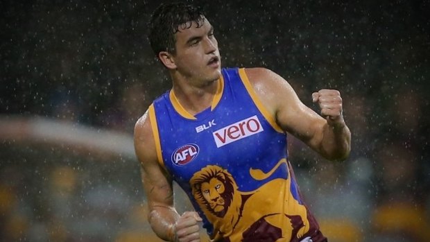 On the move: Tom Rockliff.