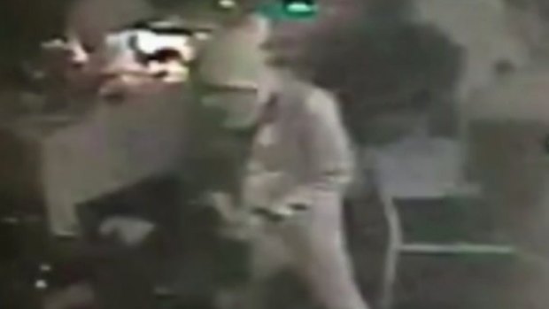 A framegrab on Sunday, January 1, 2017 of an attacker carrying a gun in the Reina nightclub in Istanbul. The gunman fired 180 rounds for seven minutes, killing 39 people.