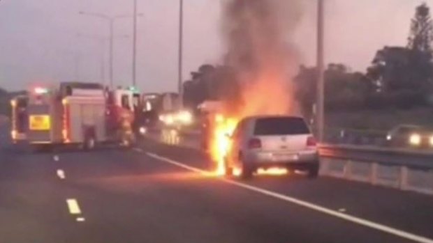A car fire closed three lanes on the Pacific Motorway.