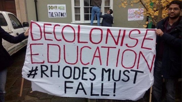 Protesters call for the downfall of the Cecil Rhodes statue at Oriel College.