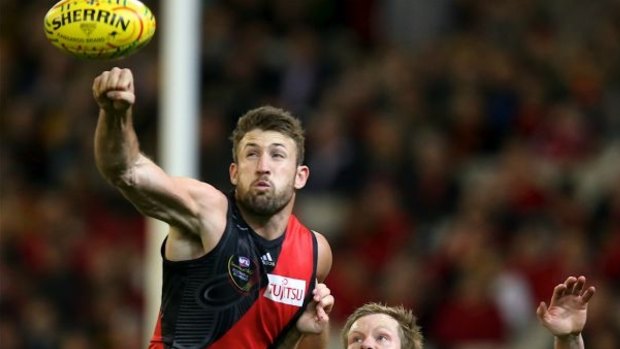 Rugged defender Cale Hooker won't be heading to the Dockers after signing five-year deal with the Bombers.