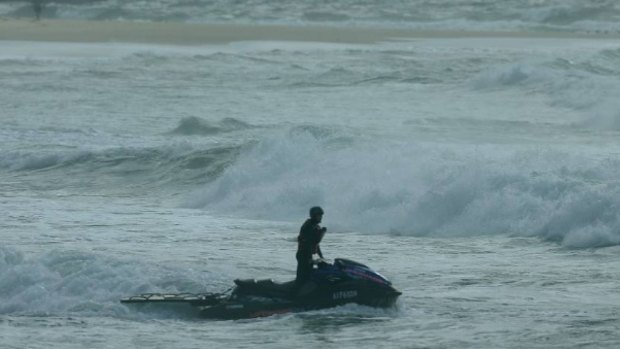 A jetski searching for the man at Nobbys Beach. 