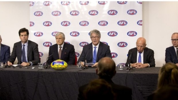 AFL chief executive Gillon McLachlan with (left to right) Kerry Stokes, AFL chairman Mike Fitzpatrick, and Rupert Murdoch as they announce the record-breaking deal.