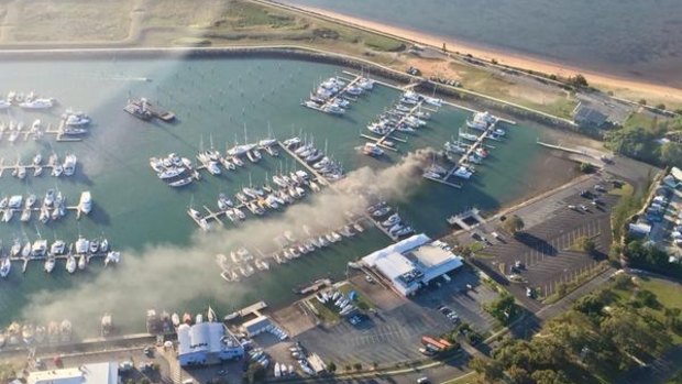Smoke billows from a yacht at Compass Marina in Scarborough.