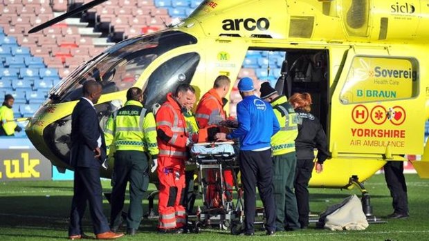 Huddersfield's Tommy Smith was airlifted from the field.