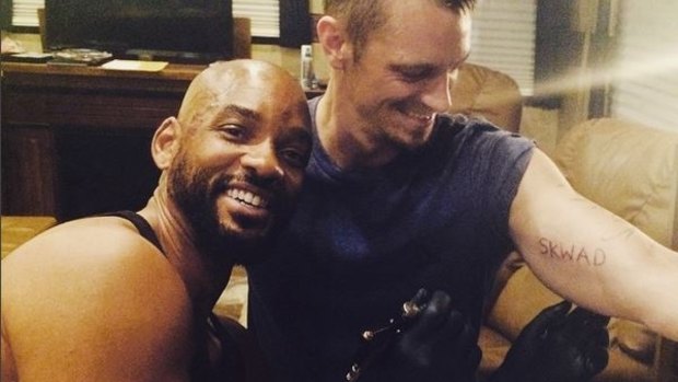 Will Smith tattooing his <i>Suicide Squad</i> cast mate Joel Kinnaman.