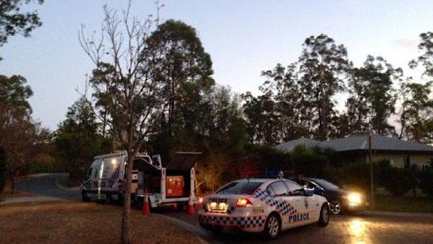 Police outside the Pullenvale home on August 13 after the discovery of the explosives.