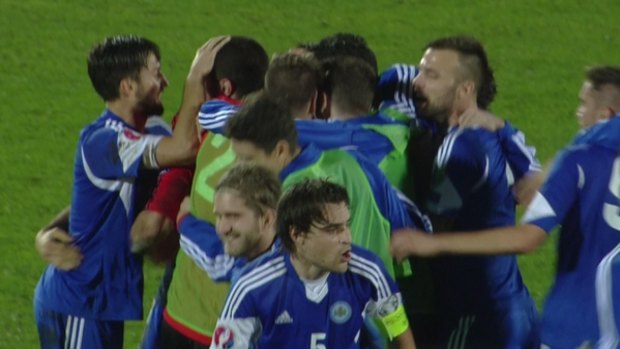 San Marino players celebrate their first ever Euro qualifiers point.