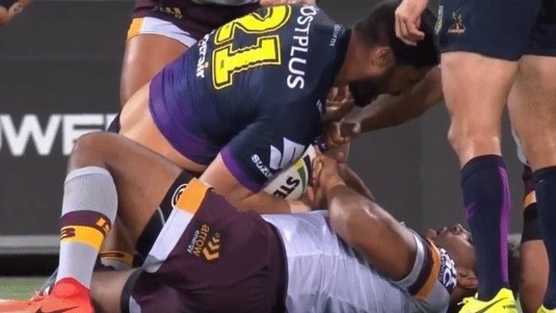 Charge: Sam Thaiday appears to yank on Jesse Bromwich's dislocated thumb during a tackle.