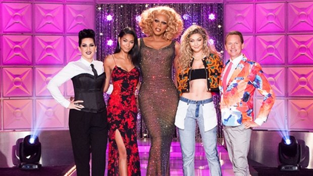 RuPaul (centre) with celebrity judges on <i>RuPaul's Drag Race</i>.