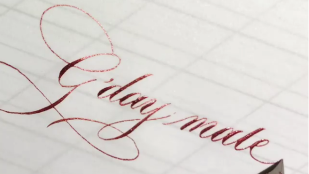 Moya Carroll demonstrates her calligraphy skills on social media.