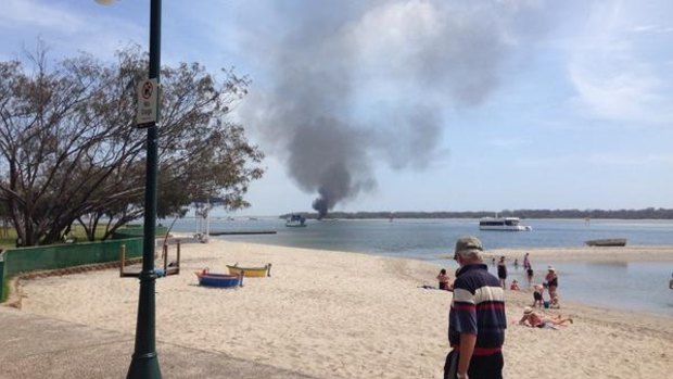 A boat on fire in the Gold Coast Broadwater. 