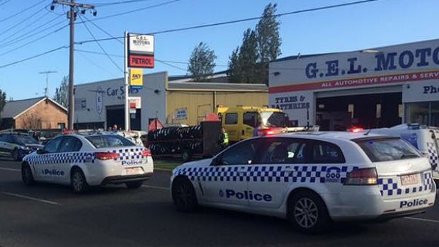 G.E.L. Motors in North Geelong where a police gun has gone off in a holster during a scuffle.