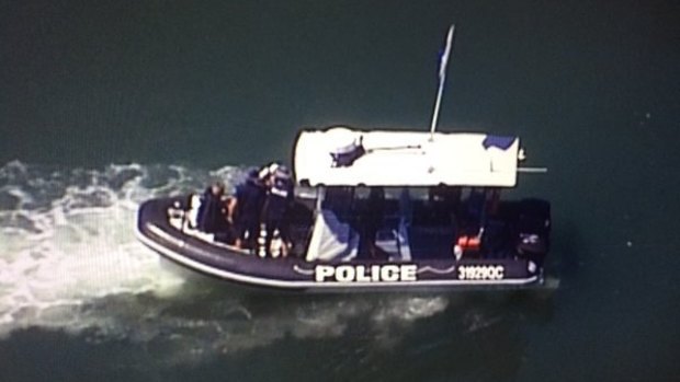 Police search canals for a missing snorkeller in Noosa on Boxing Day.