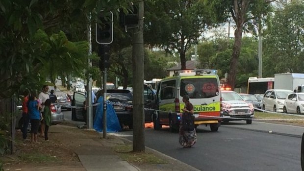 A woman in her 20s died while crossing the road in Sunnybank on Wednesday morning.