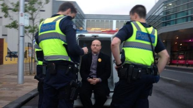 Baptist minister Simon Moyle is arrested.
