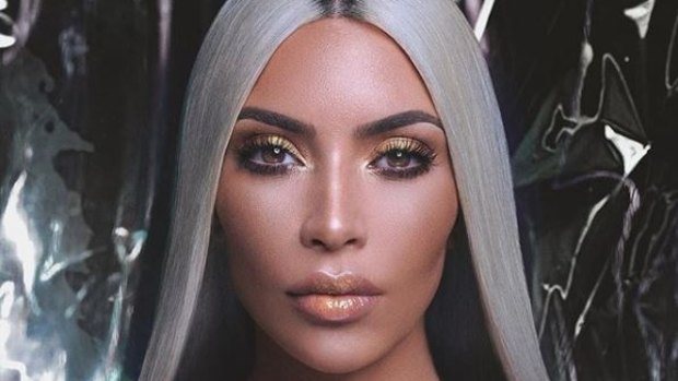 Kim Kardashian has dyed her naturally dark hair silver.