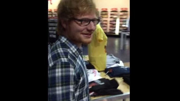 Ed Sheeran prepares to surprise a Canadian teenage busker at a shopping mall. 