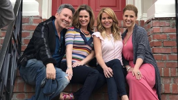 Franklin on-set with the show's stars Andrea Barber, Candace Cameron Bure and Stephanie Tanner.