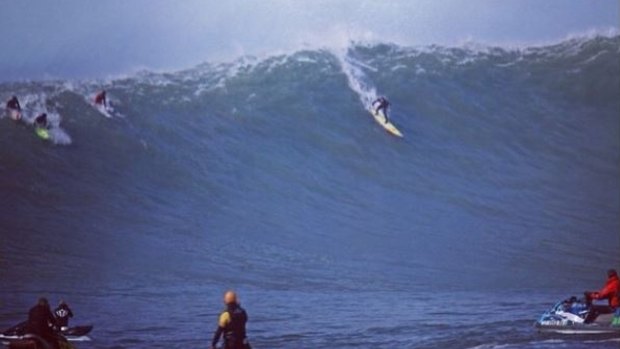 Shawn Dollar takes off on a 16.7-metre wave at Mavericks in 2010. The American big-wave surfer has broken his neck while competing at the Titans of Maverick competition.