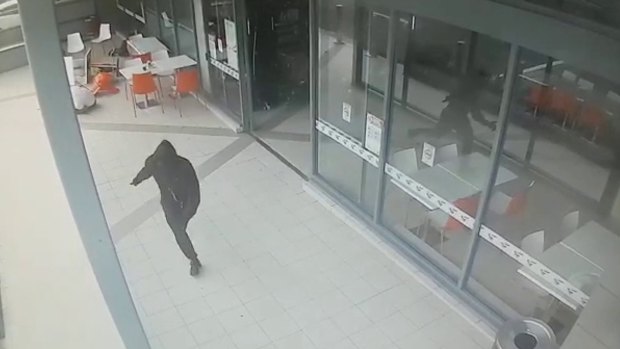 CCTV shows the moment an unidentified killer fatally shot Walid "Wally" Ahmad at a Bankstown shopping centre.
