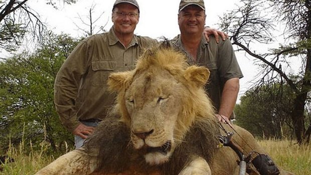 Hunter Walter James Palmer, left, with another lion he killed.