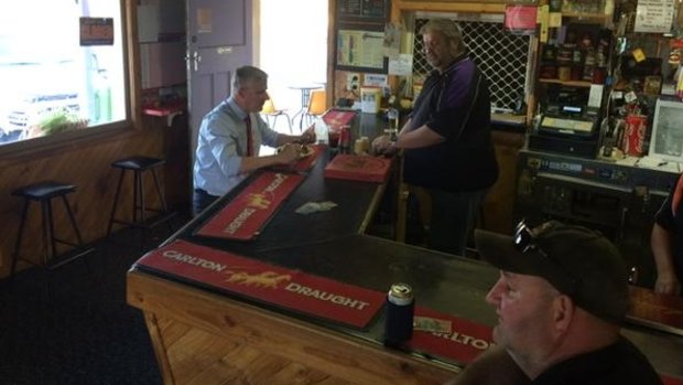 Michael McCormack has a bite to eat at the Royal Hotel in Grong Grong on Thursday.
