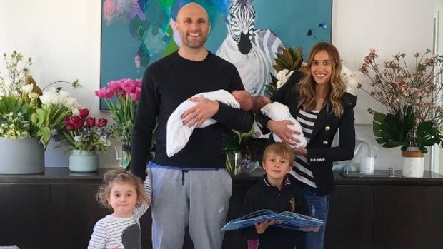 Judd and husband Chris Judd with their four children.