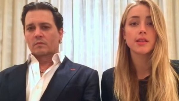 Johnny Depp and Amber Heard in their awkward apology video. 