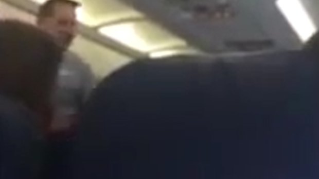 The flight attendant caught on video.