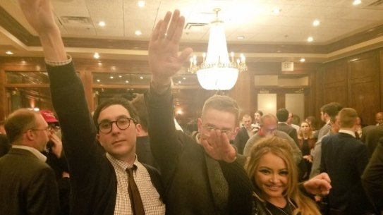 Former reality star Tila Tequila, right, giving a Nazi salute at the alt-right conference in Washington DC on Saturday.