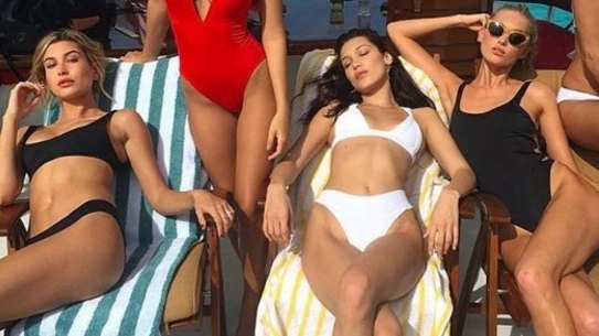 Model Rose Bertam, pictured with fellow models including Bella Hadid and Emily Ratajkowski, promoting Fyre Festival on Instagram.