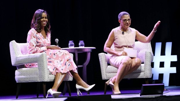 Former First Lady Michelle Obama speaks, emphasising that women must celebrate their strength, during a live conversation with The Women's Foundation of Colorado President and CEO Lauren Y. Casteel.