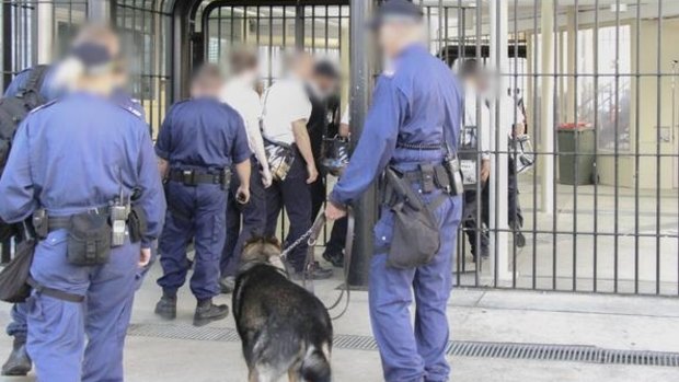 Corrective Services officers search for contraband at Parklea prison.